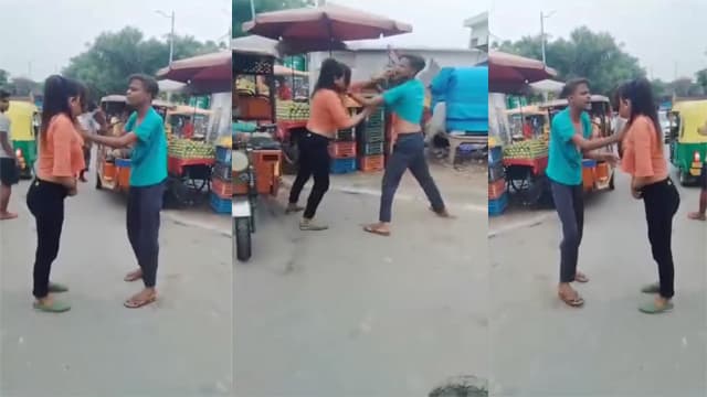 A fight broke out between a boy and a girl on the street leaving the girl stripped naked